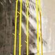 Yellow lase metal coat hanger 90's