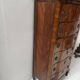 Transitional style chest of drawers in rosewood and amaranth veneer, 20th century.