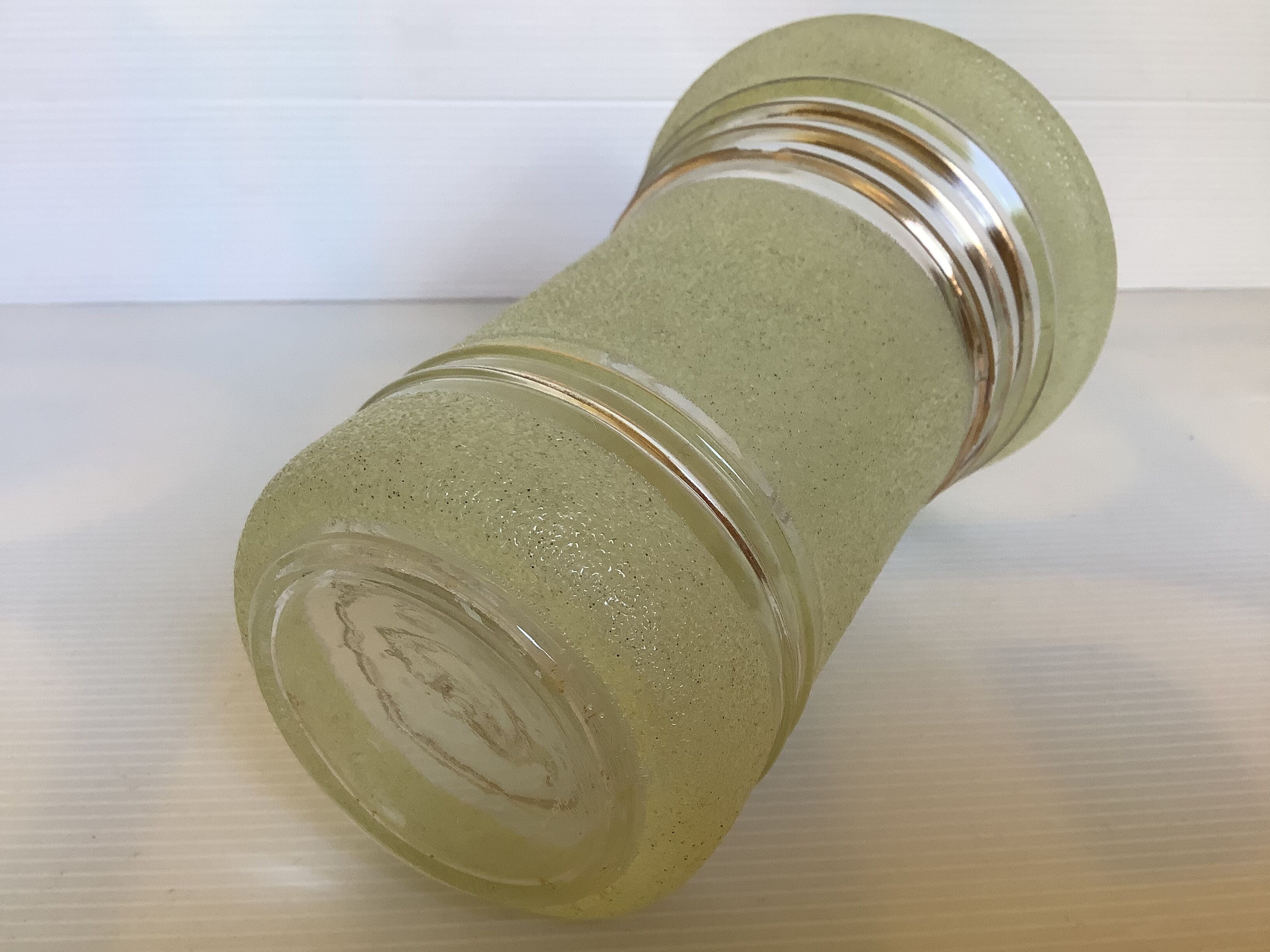 Old yellow frosted glass vase