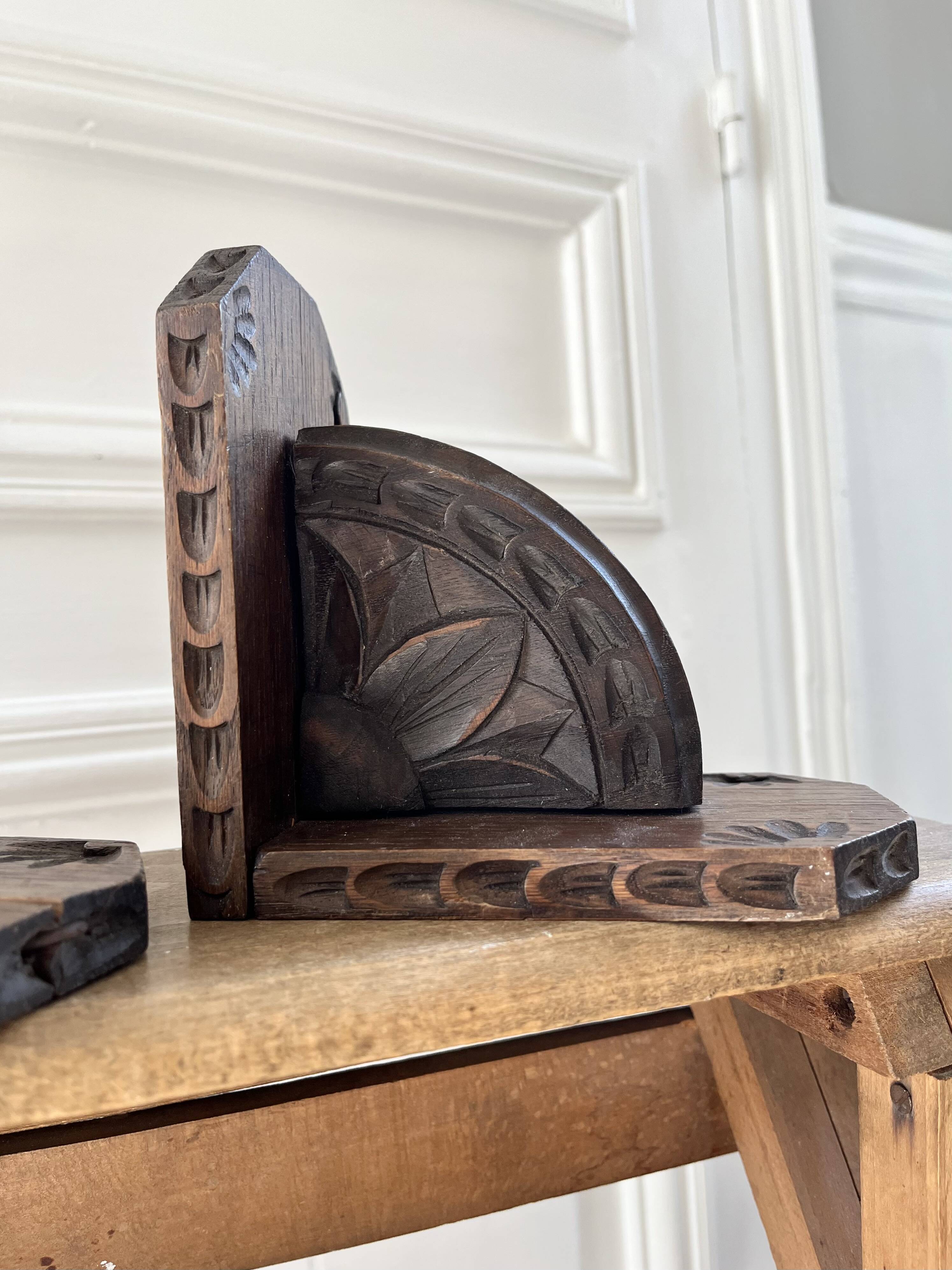 Pair of carved wooden bookends