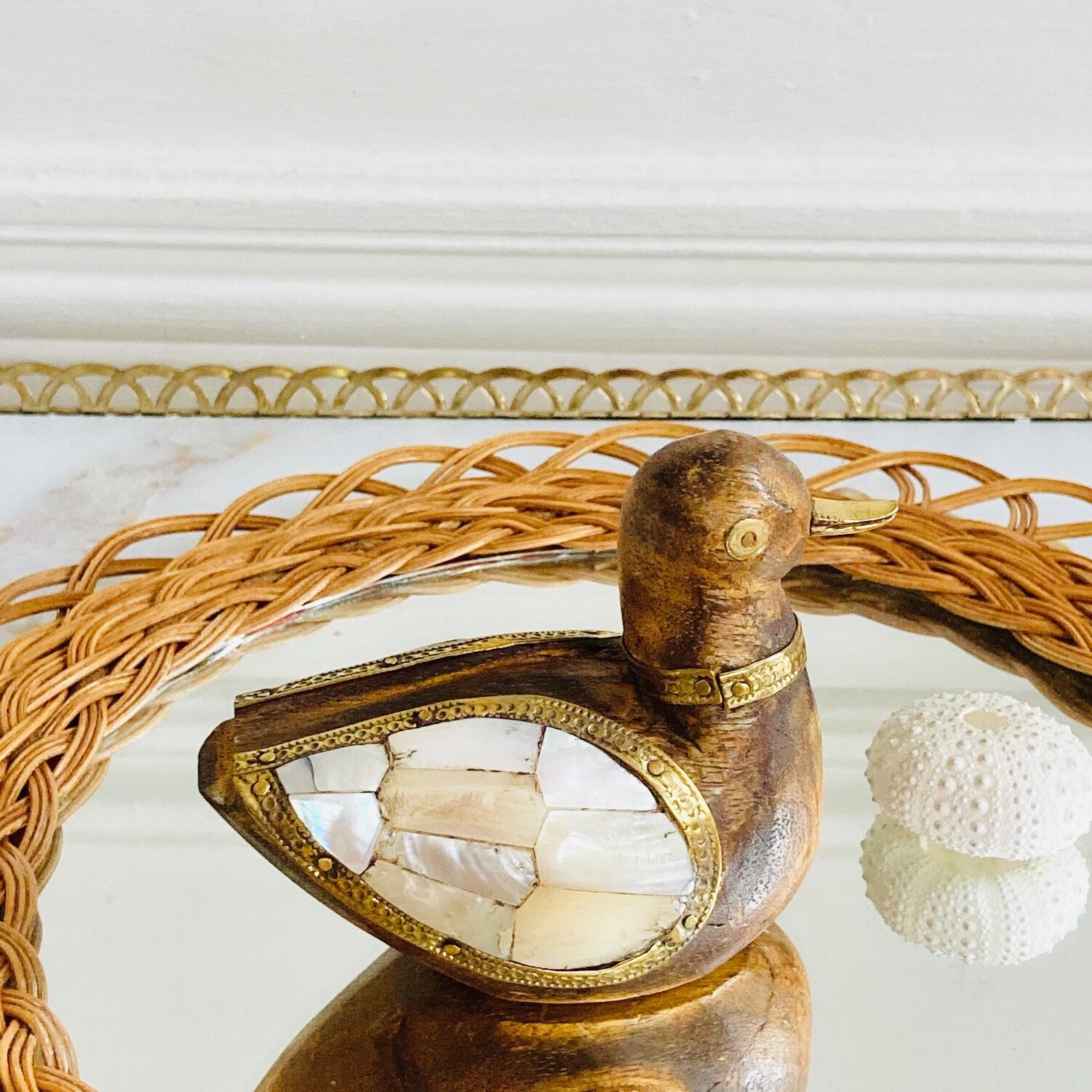 Wood brass duck and mother-of-pearl