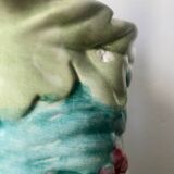 Parakeet pitcher in slip