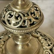 pair of openwork gilded brass candlesticks from the 19th century