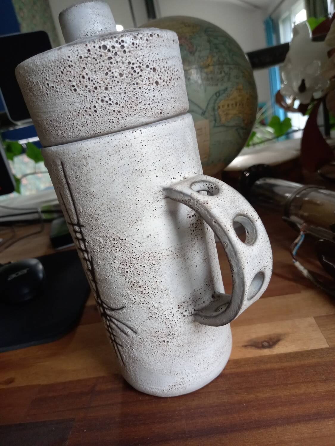 Henri Cimal's pitcher in Vallauris ceramic for the Palissy gallery.