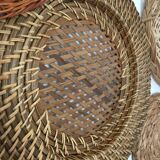 Wall composition of seven baskets and wicker trays
