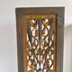 Rectangular Indonesian construction element with blue and yellow plant in carved wood