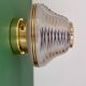 Vintage Art Deco globe wall/ceiling light in white, black, and gold glass.