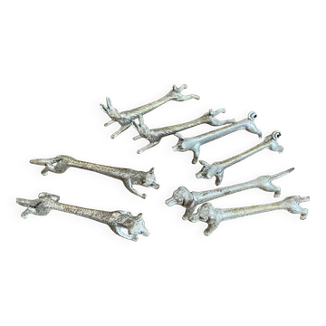 Suite de 8 porte-couteaux anciens en métal argenté Animaux
