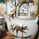 Asian set of a teapot and its cups