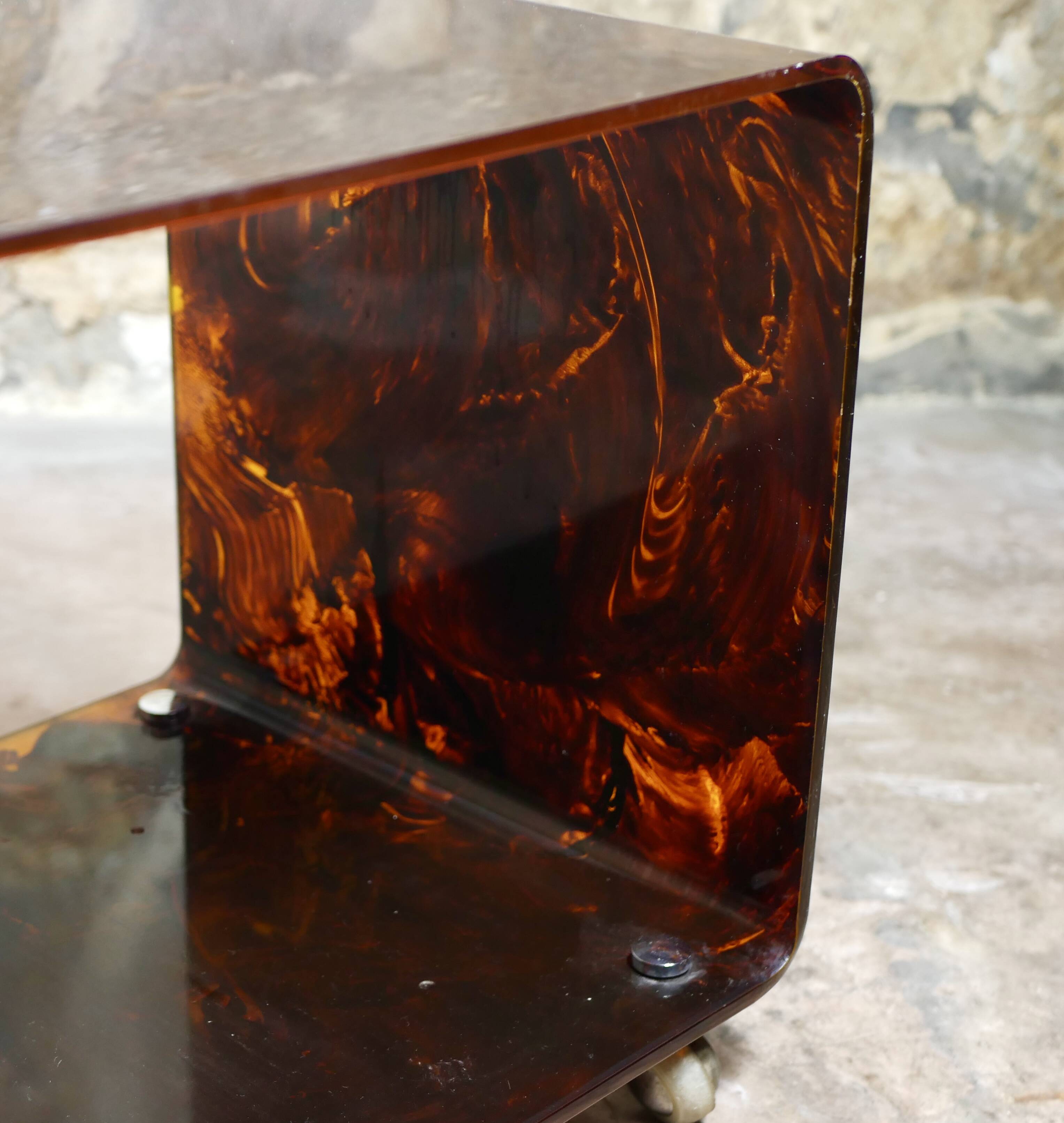 Tortoiseshell plexi side table on casters
