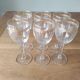 Set of 6 glasses with gold band decorations.