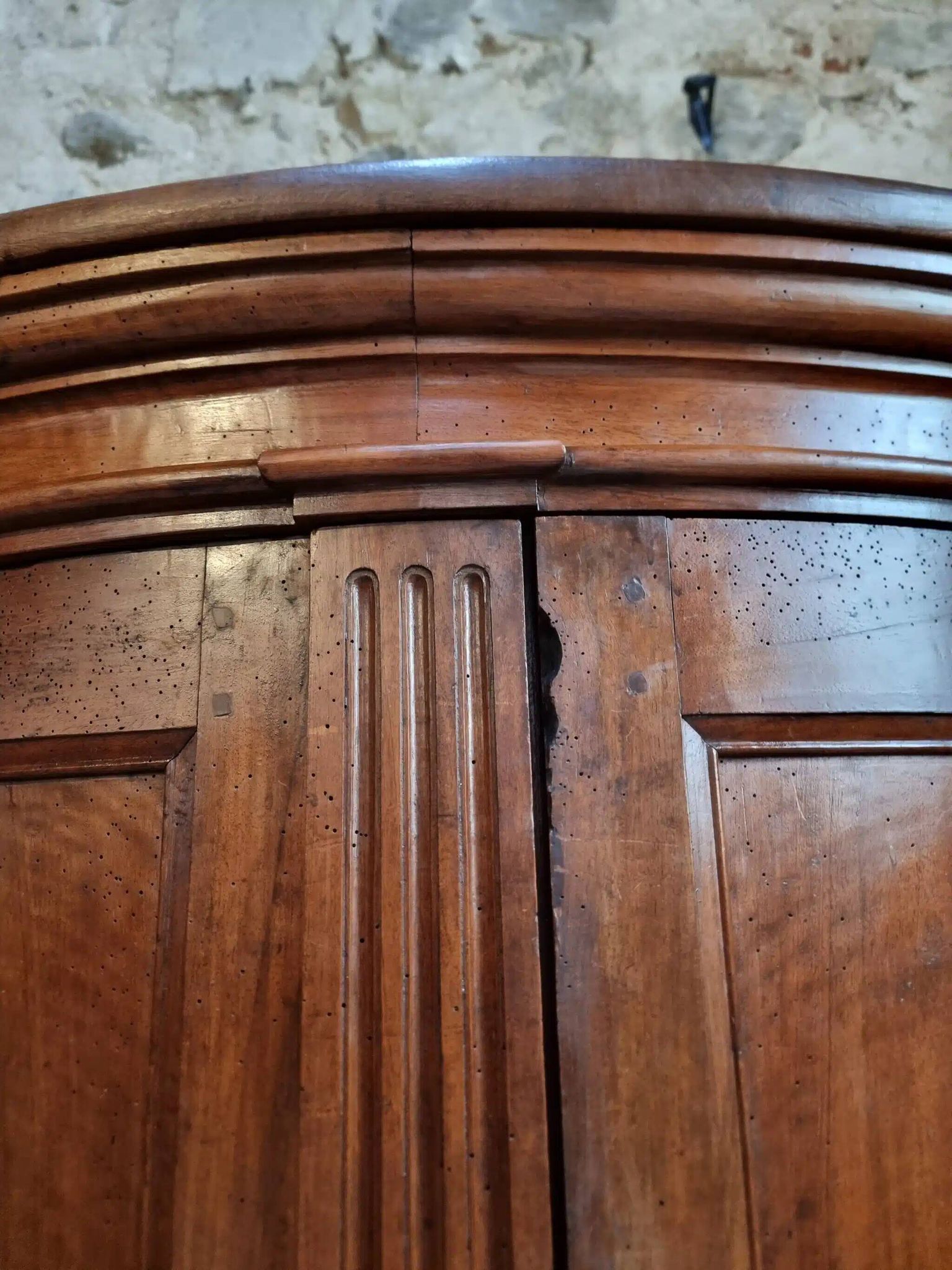 Antique demi-lune cabinet in walnut, late 18th century, French château.