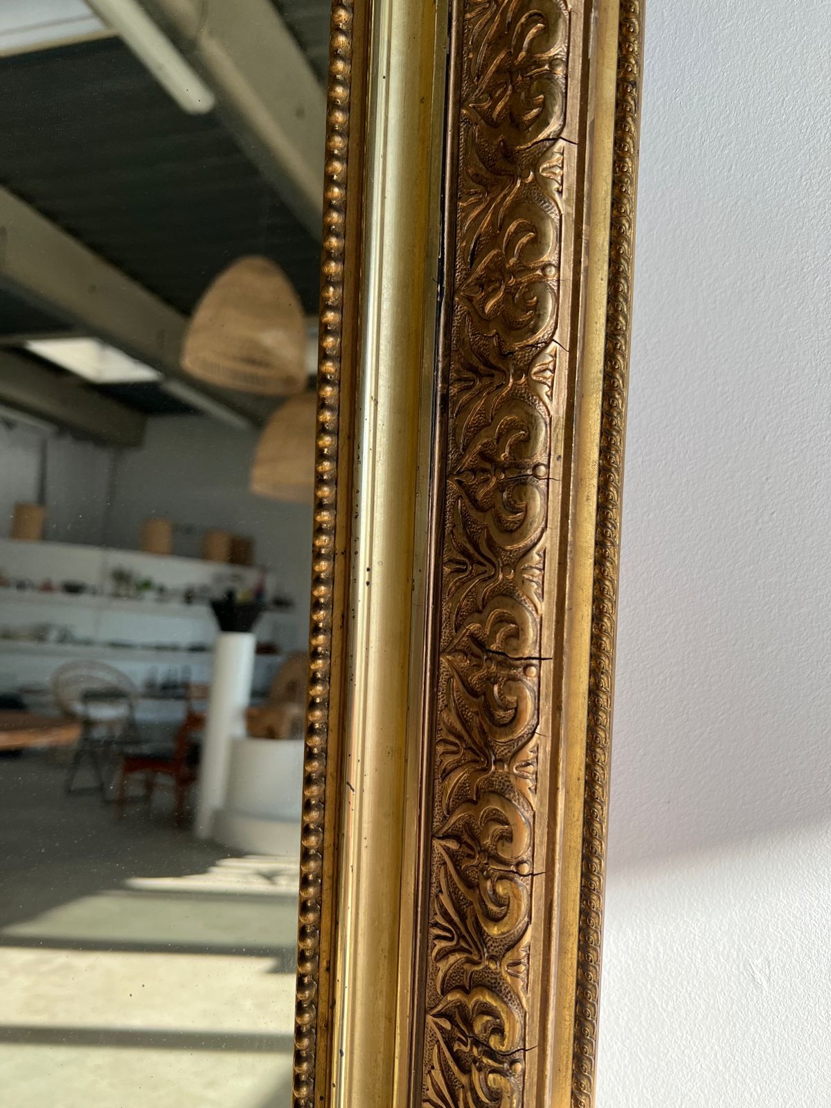 Gilded mirror with frieze h2m10 l:73cm