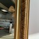 Gilded mirror with frieze h2m10 l:73cm