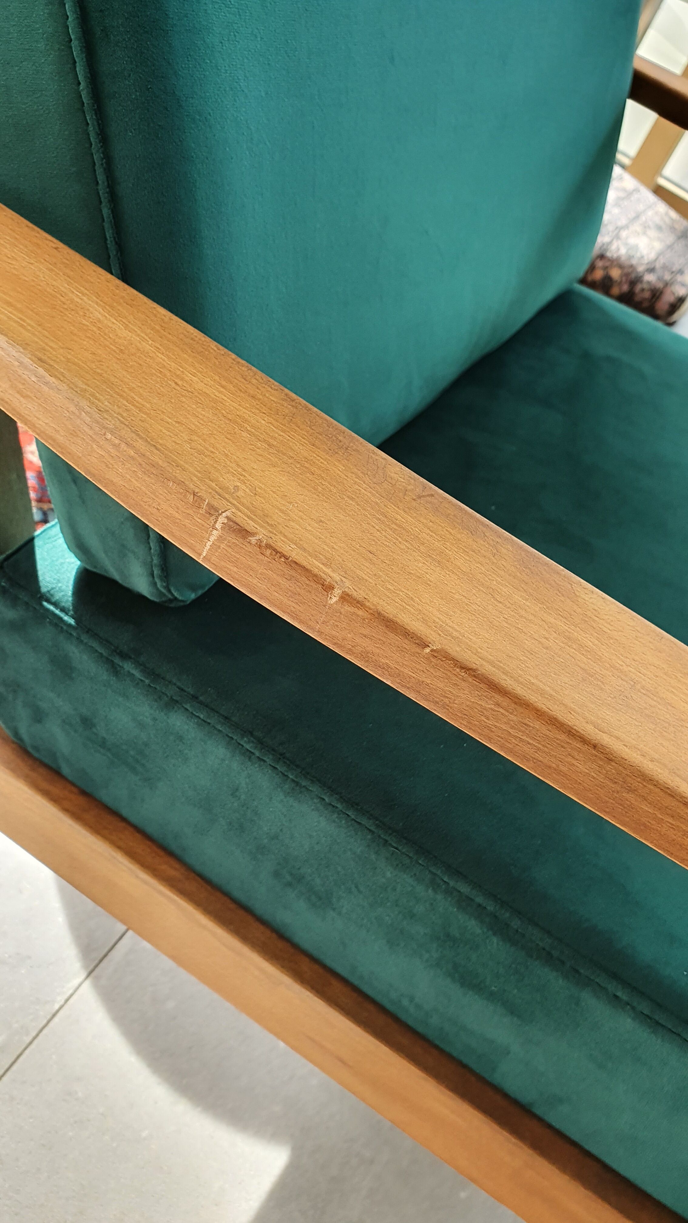 Scandinavian style armchair in forest green velvet