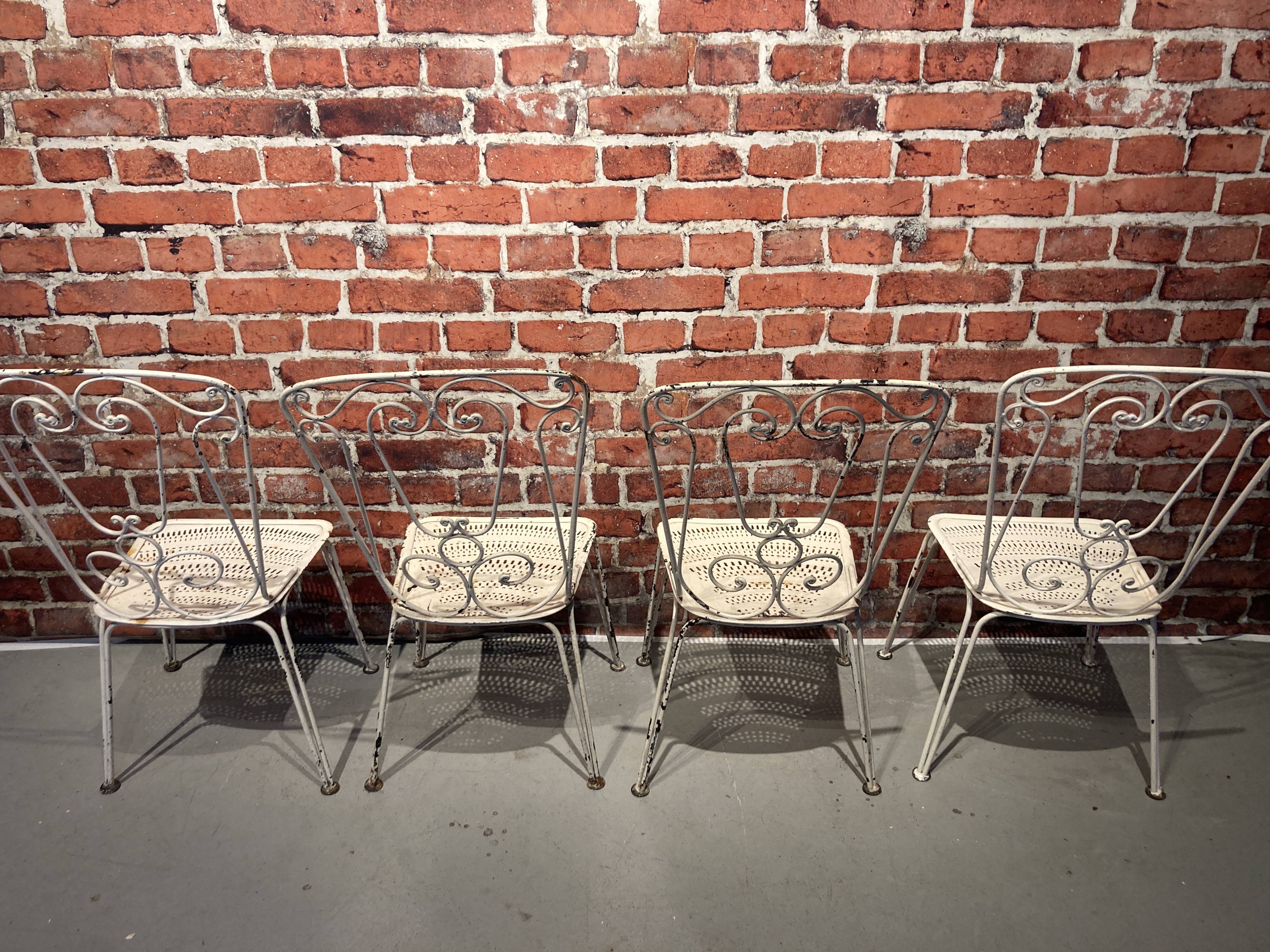 Wrought iron garden set painted white