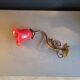 Tulip wall light in brass and red glass