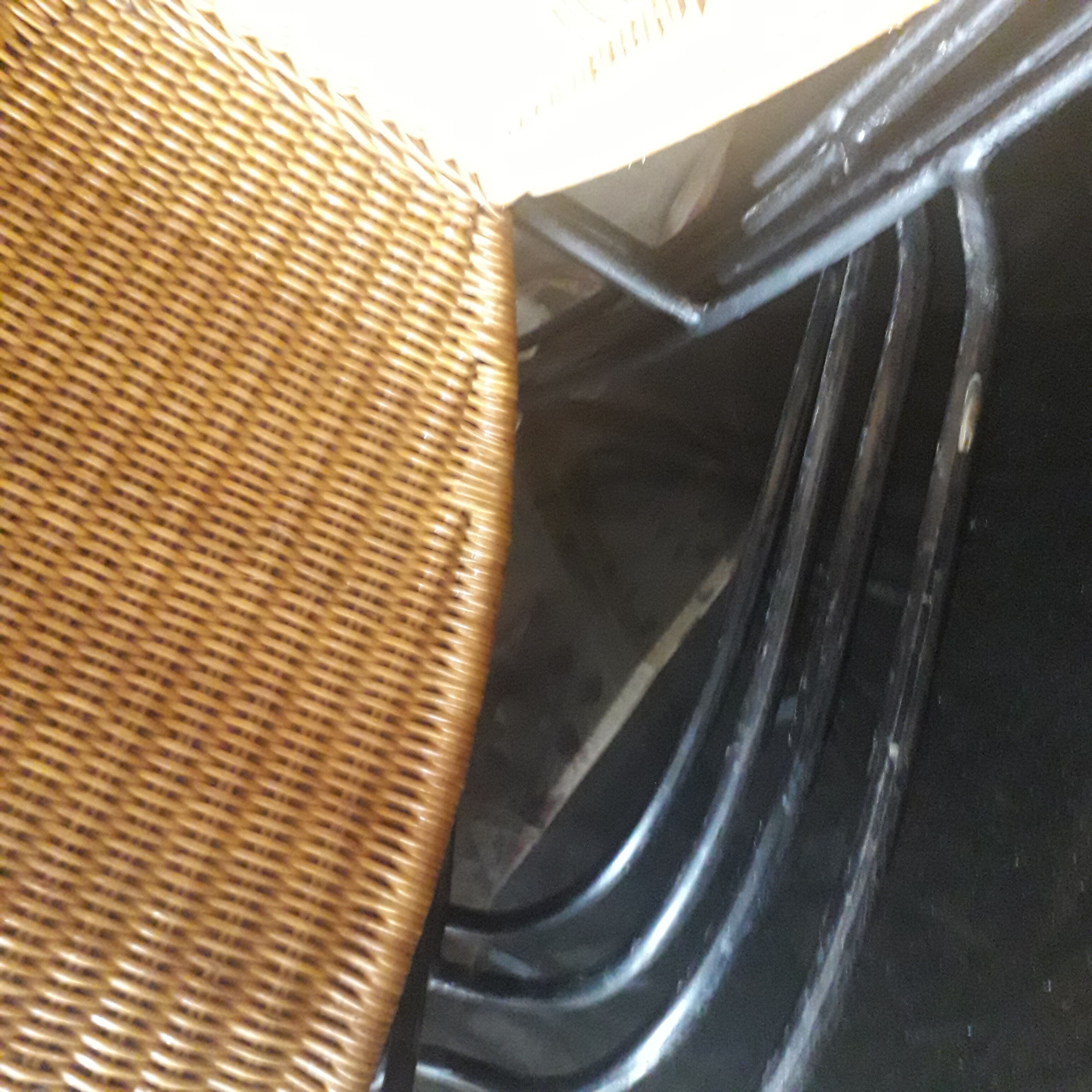 4 vintage wrought iron rattan chairs.