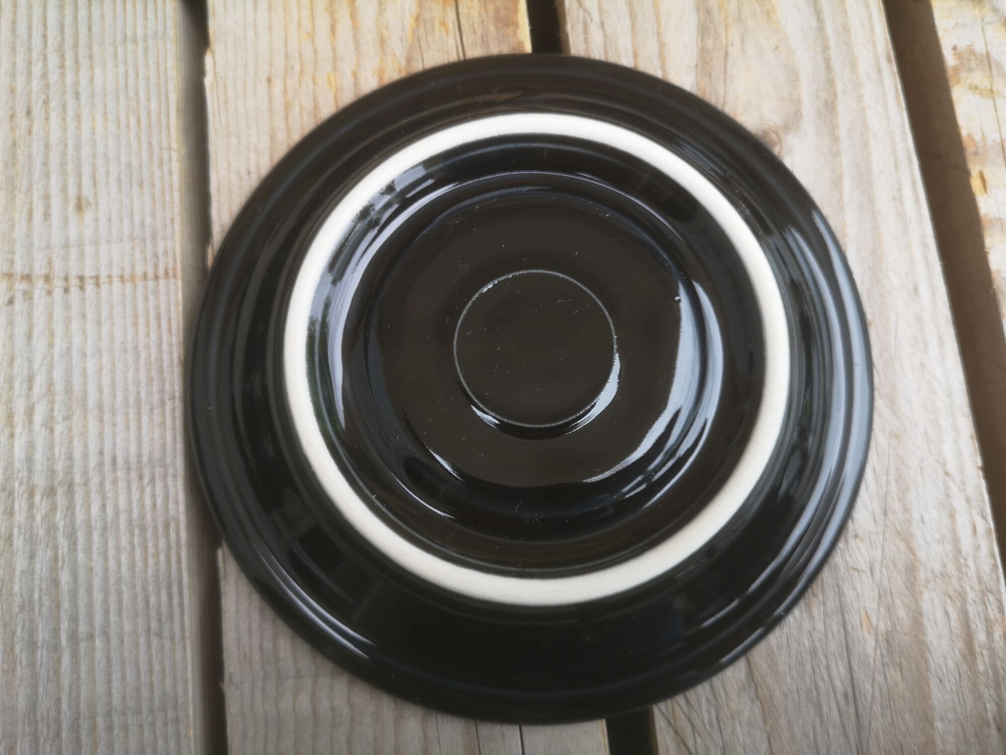 Set of 9 cups and sub-cups in black ceramic and colored gold border