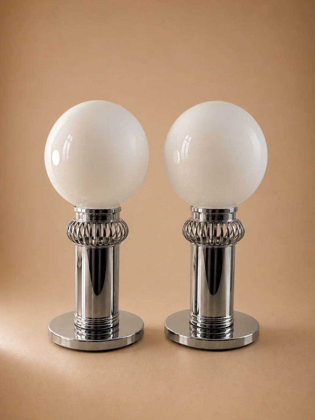 Pair of chrome lamps with opaline globes — 1970s