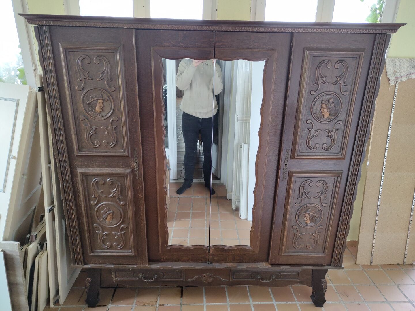 Antique wardrobe in Henri II style – carved oak – 4 doors with mirror