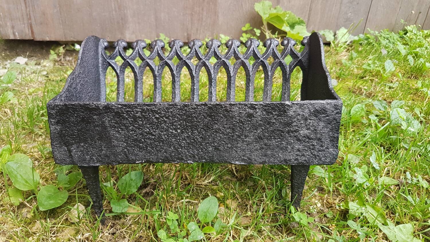 Old vintage black cast iron fireplace