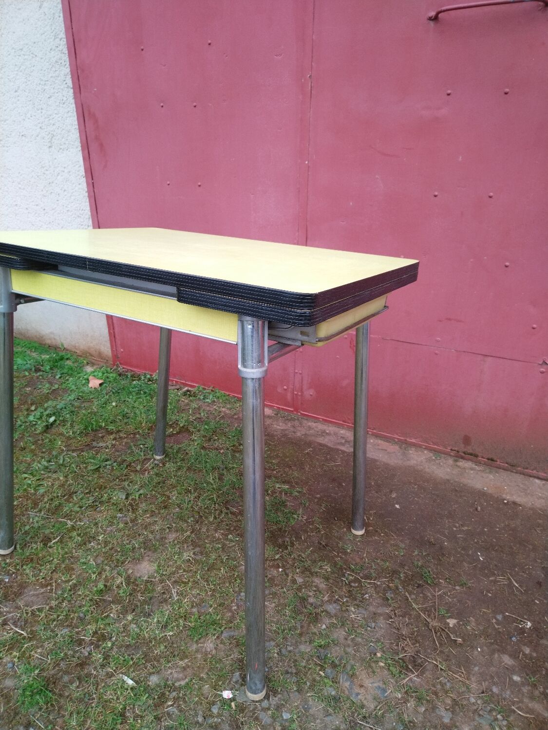 Yellow formica table with extensions