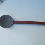 Vintage brown enamelled ladle