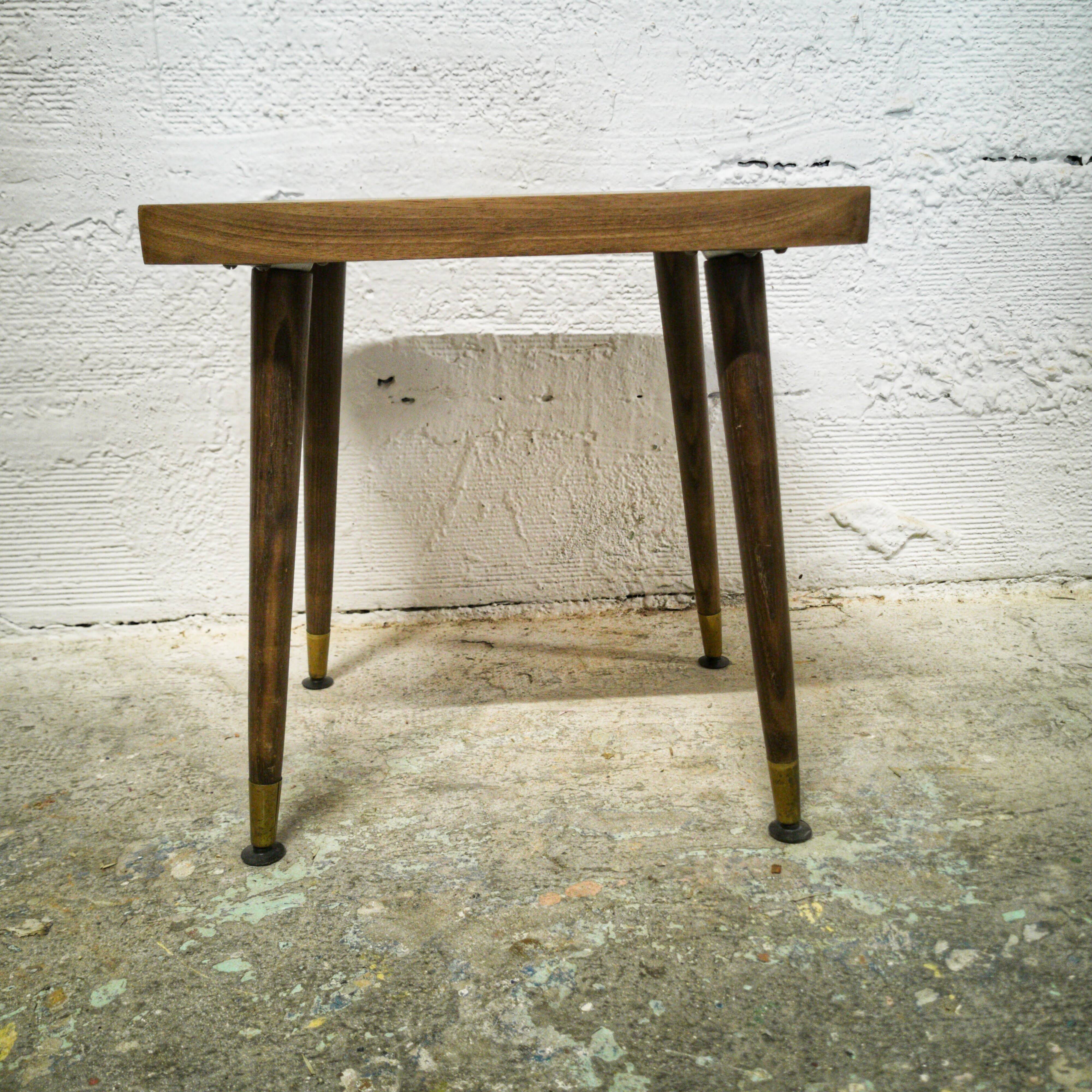 Side table with compass legs