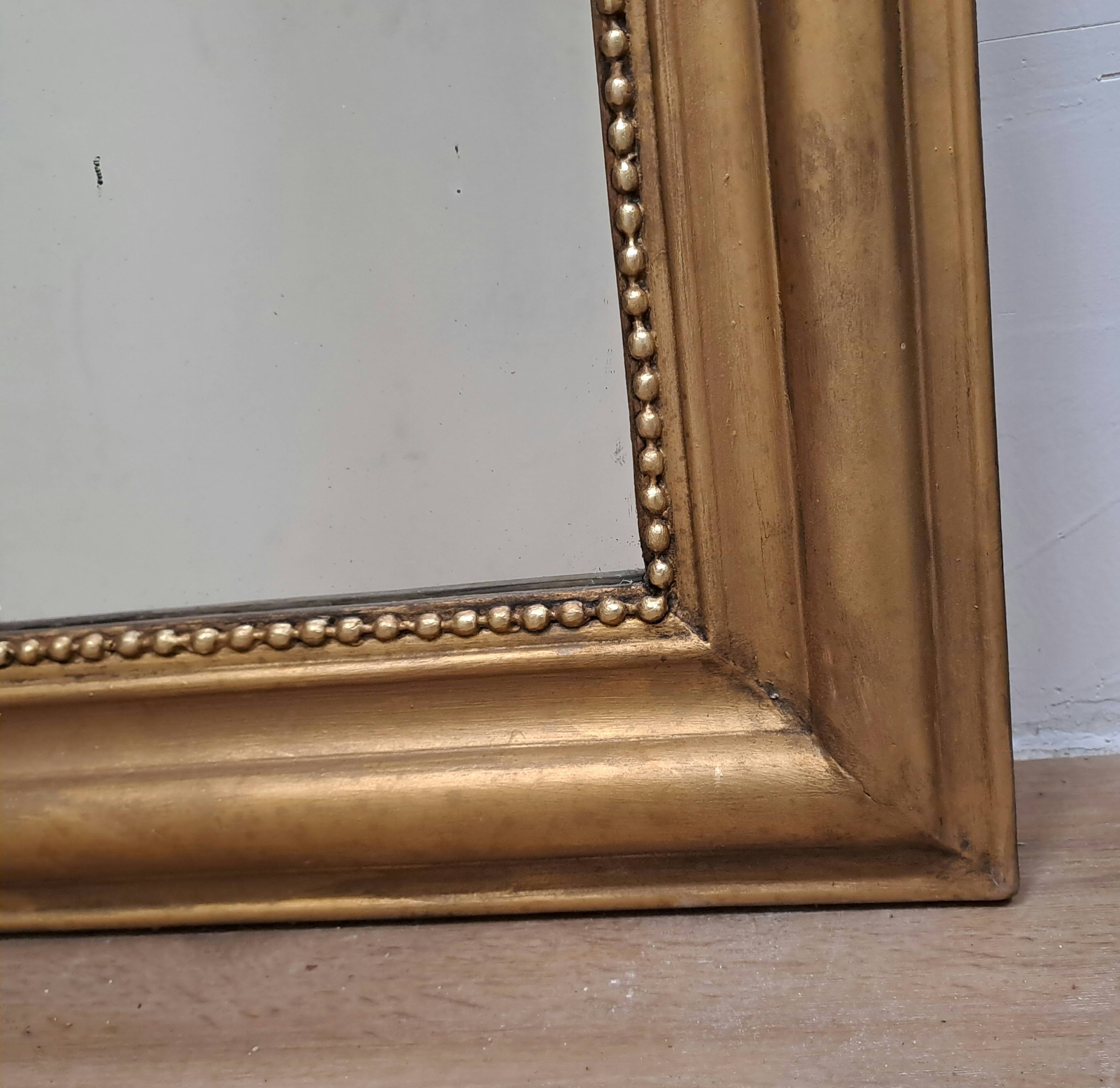 Large antique Louis Philippe gilded mirror