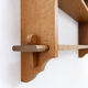 Wall shelves with dowels in Arts & Crafts style