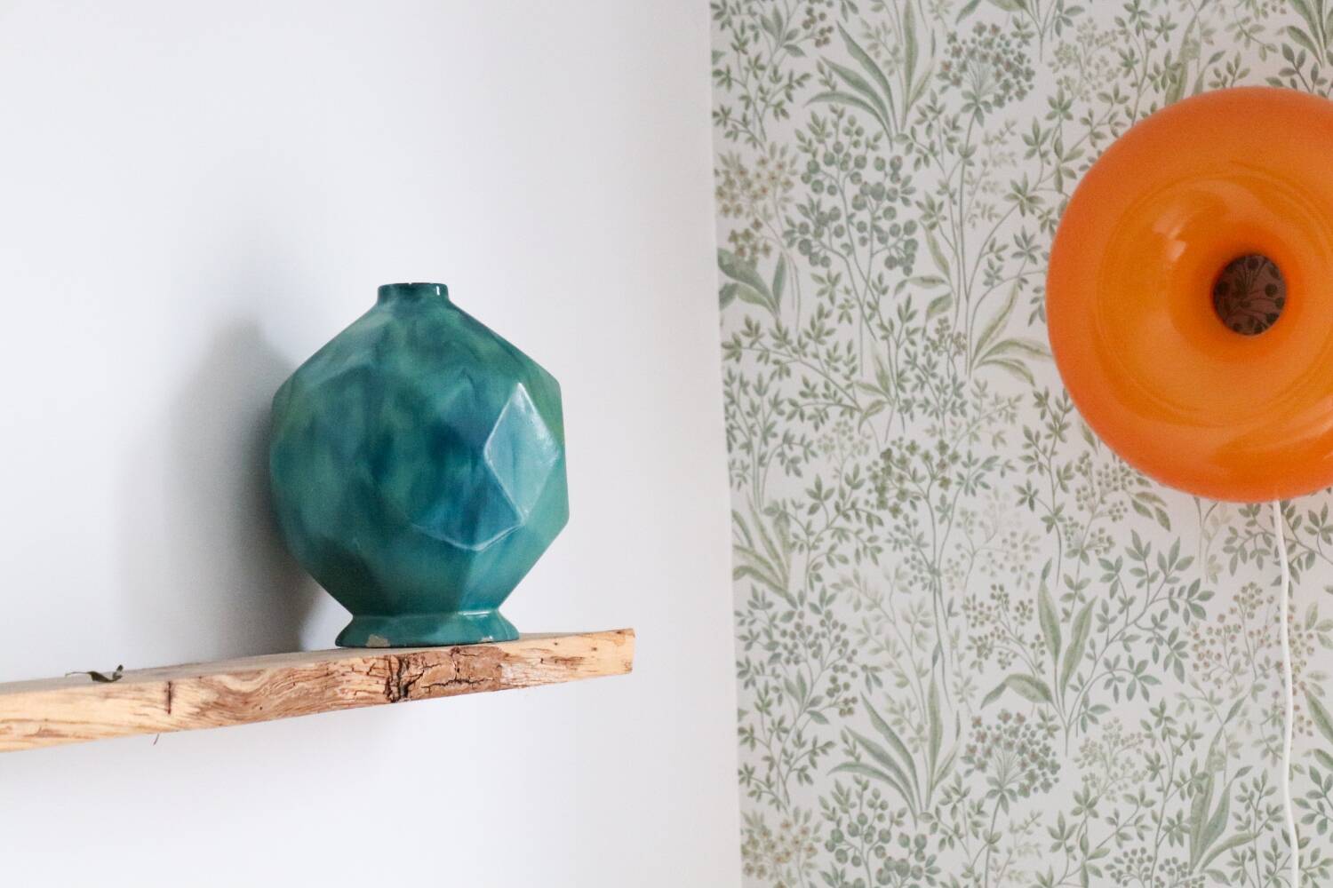 Antique blue ceramic origami ball vase