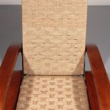 An exceptionally rare mahogany recliner crafted in Italy during the 1950s"