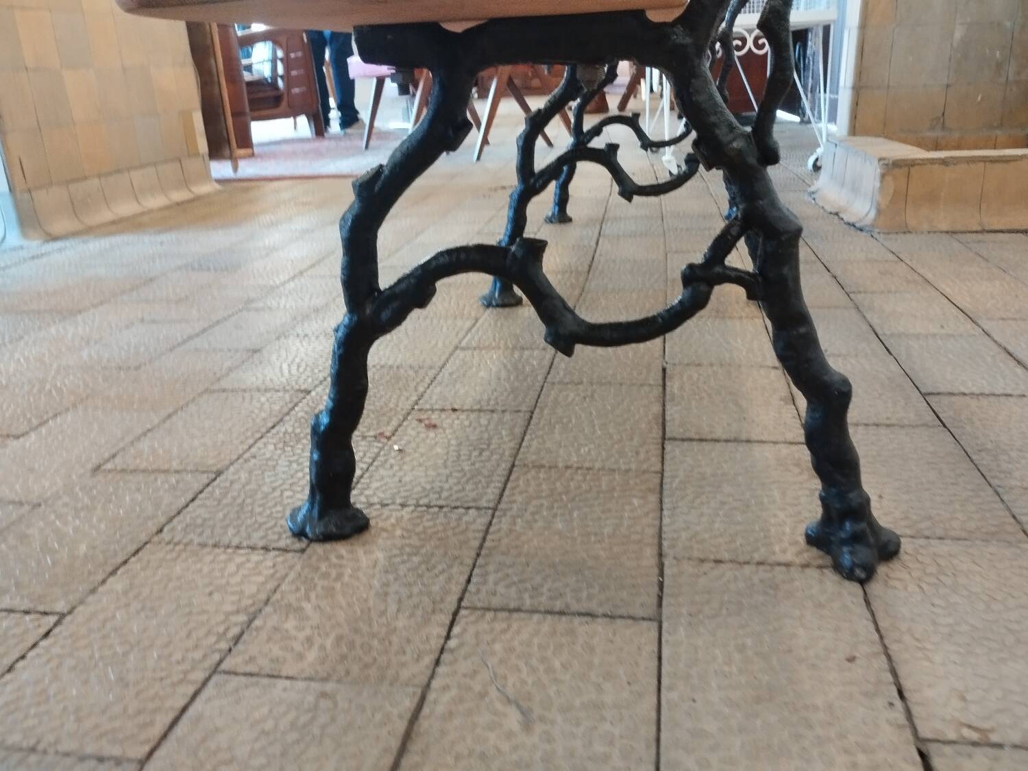 Antique garden bench with cast iron legs