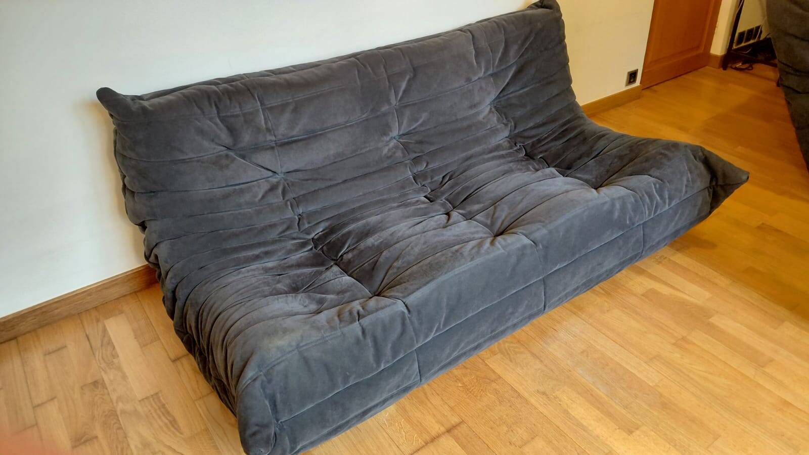 Togo corner sofa by Ligne Roset in anthracite alcantara.