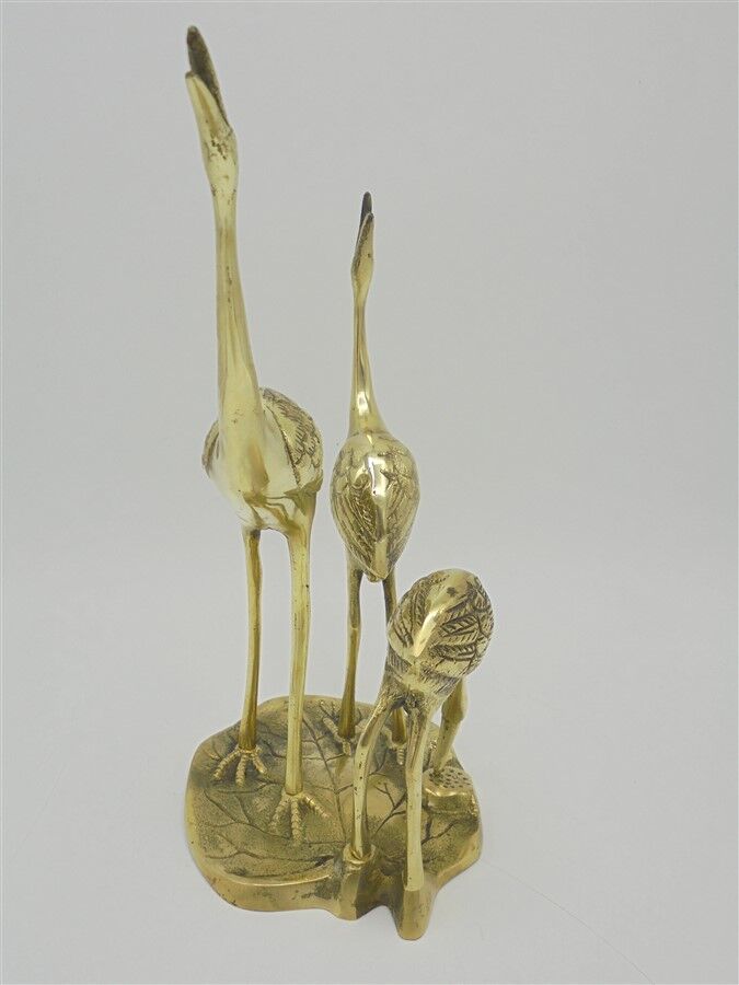 Brass herons