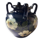 Antique Art Nouveau vase with a floral decoration.