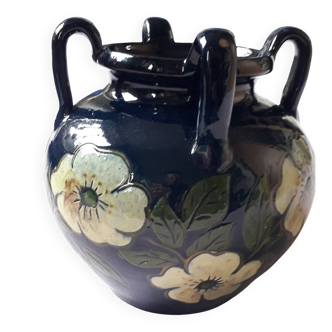Antique Art Nouveau vase with a floral decoration.