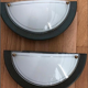Wall lamp in green and bronze glass and metal made in Italy