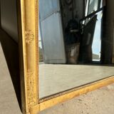 Golden mirror style Restoration decorated with stretched palmettes