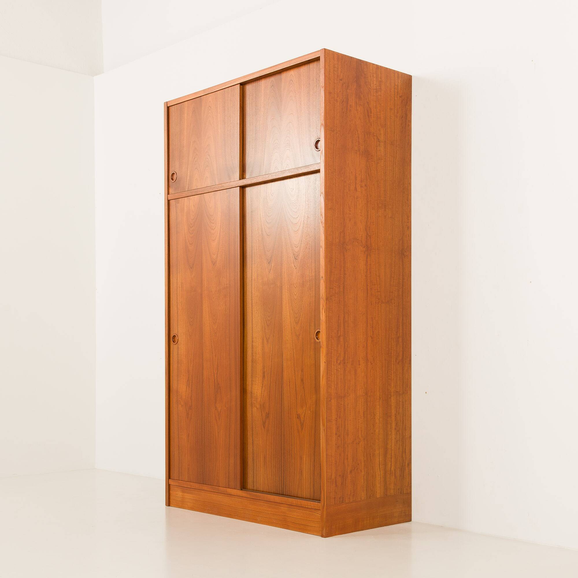 Danish teak wardrobe by Hundevad, 1960s