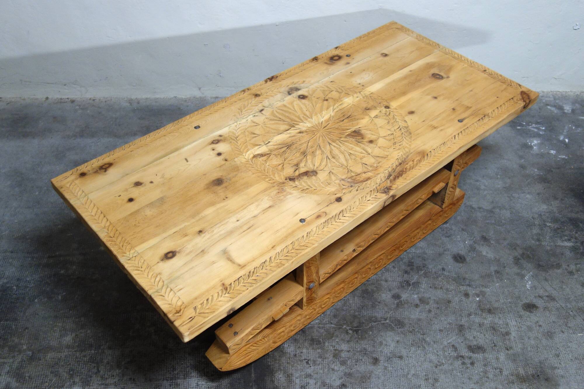 Large 19th century sculpted sled coffee table, folk art, France
