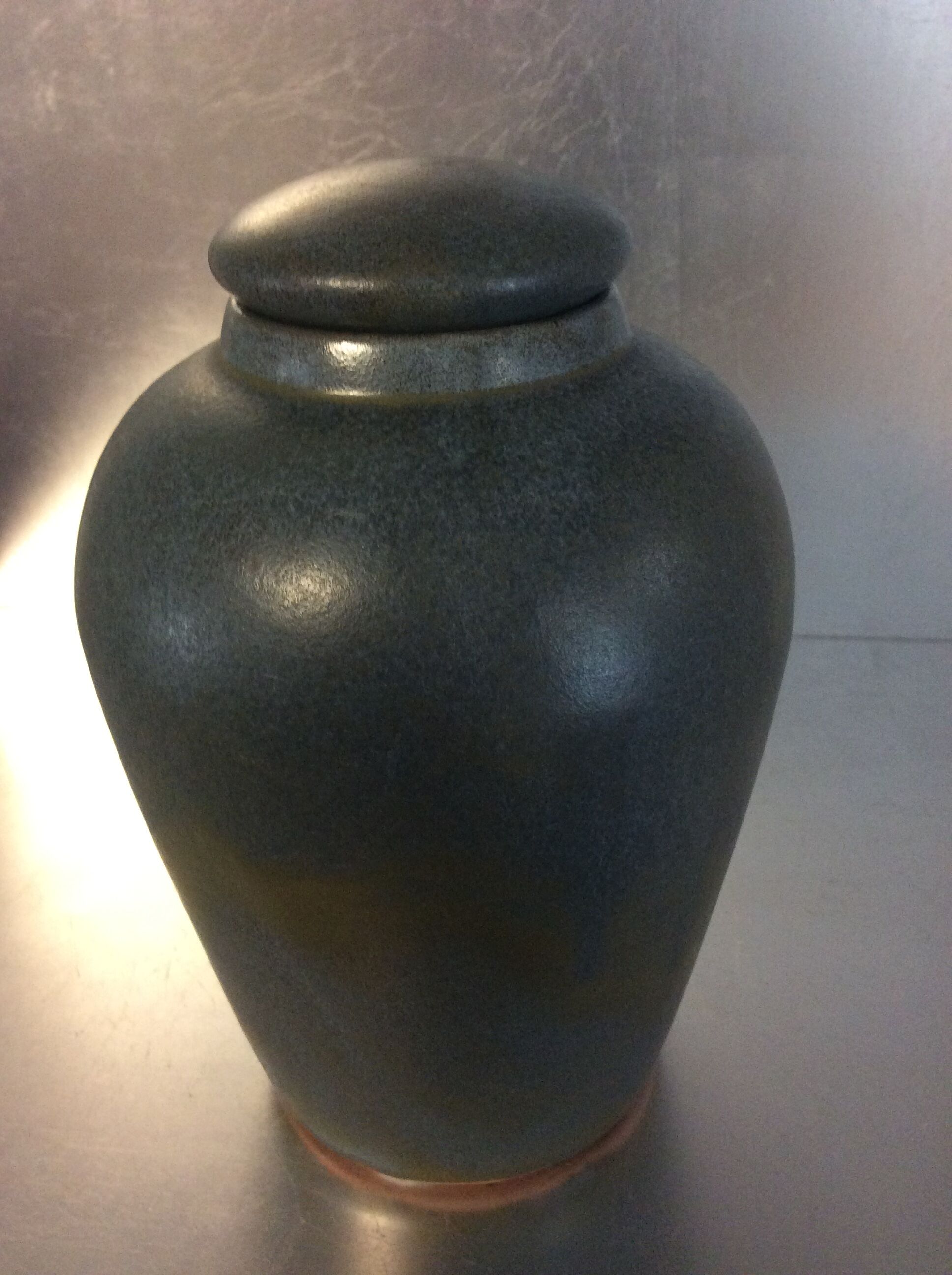 Vintage covered sandstone vase