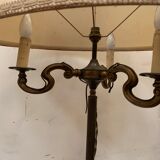 Floor lamp has three brass light arms