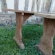 Pairs of large benches in raw fir wood.