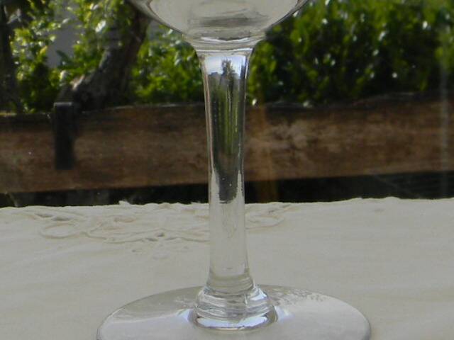 Set of 8 antique glass water glasses. Engraved floral border
