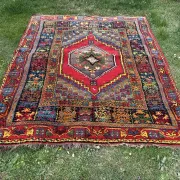 Old Moroccan carpet, made of natural wool and handwoven.
