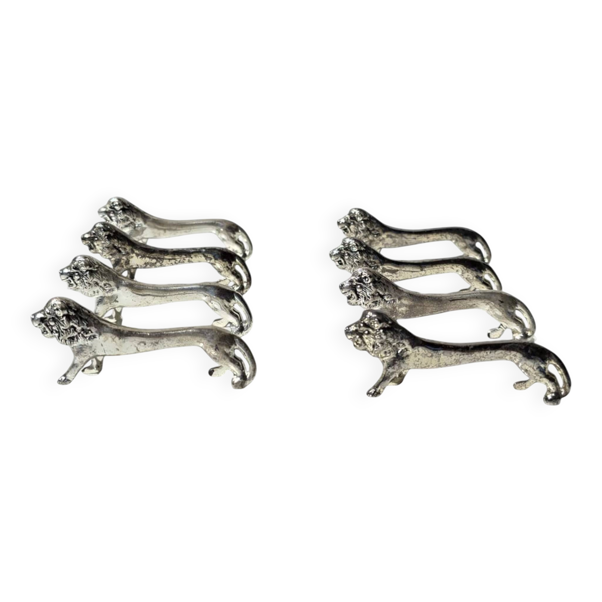 Series of antique knife rests in the shape of a lion, silver-plated metal.