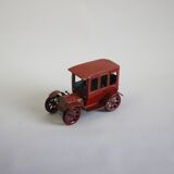 Vintage tin car with pull lever