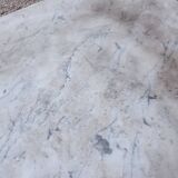 Bistro pedestal table in marble and cast iron lion paws